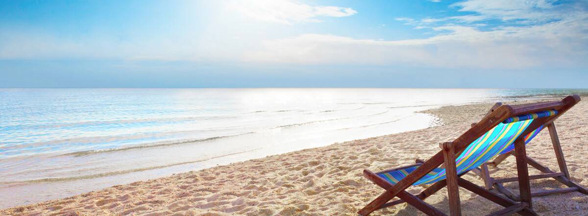 Chair on the edge of the beach